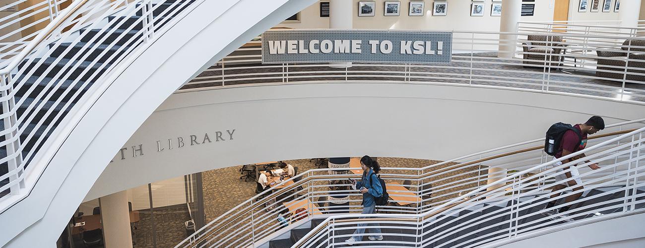 "Welcome to KSL" banner adorns the staircase at Kelvin Smith Library.