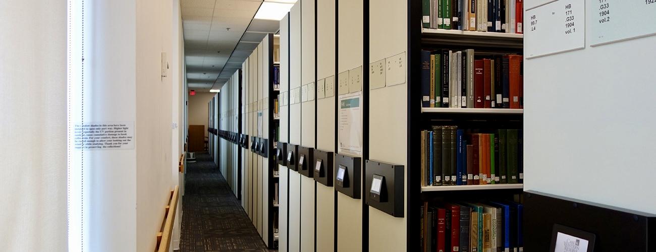 Stacks of books on the third floor at Kelvin Smith Library.