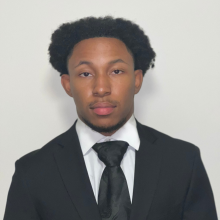 a headshot of Elian Maycock