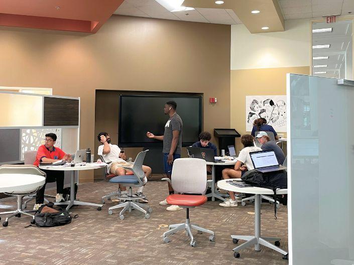 Students studying in the Freedman Center