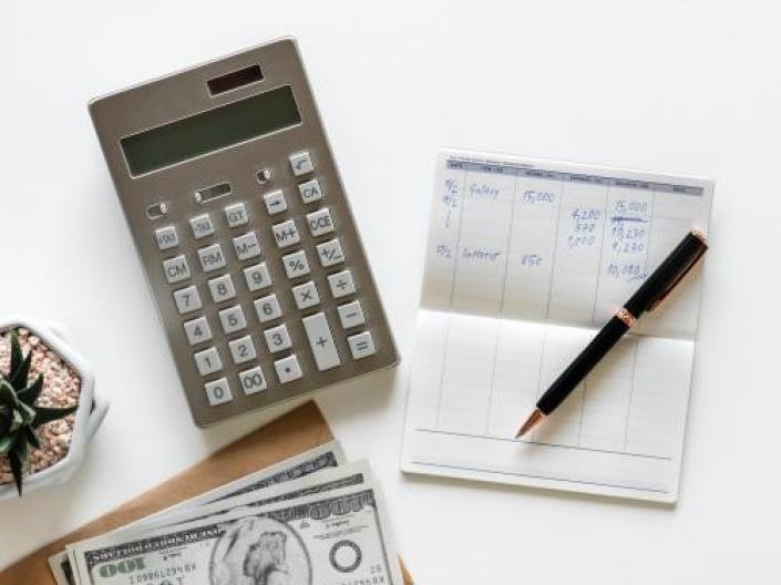 checkbook and calculator