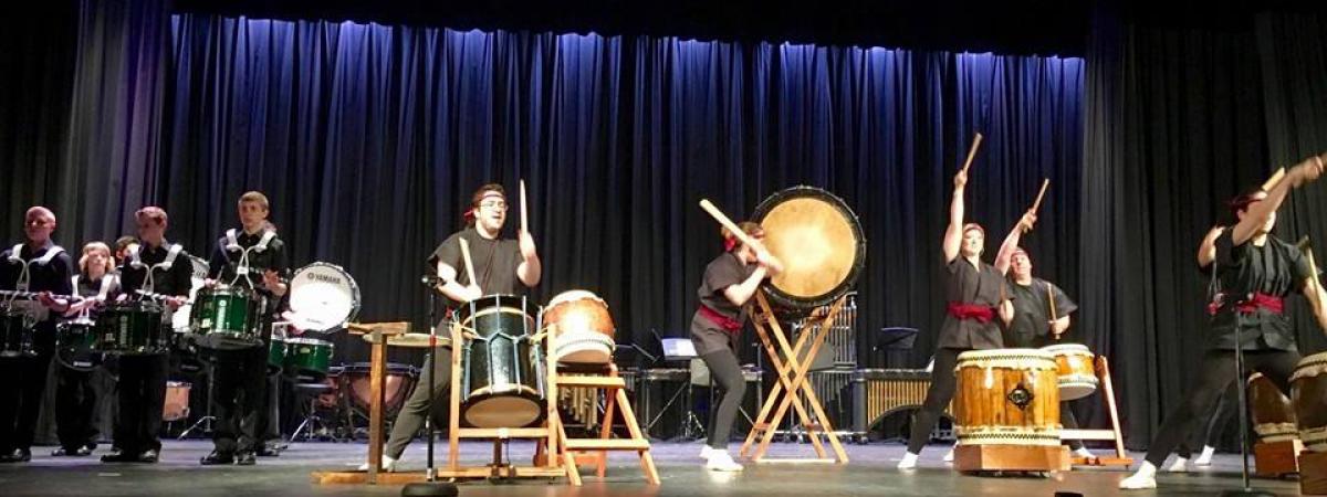 Yume Daiko performers playing drums on stage