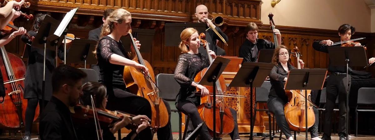 baroque artists playing the cello and trombone