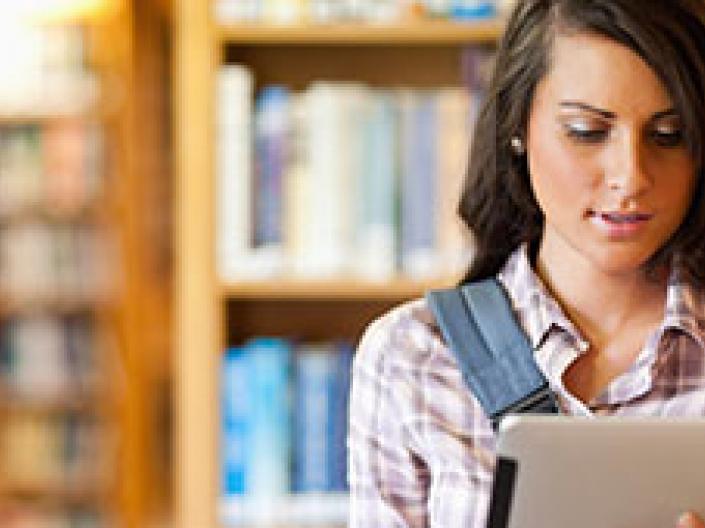 Girl in a library.