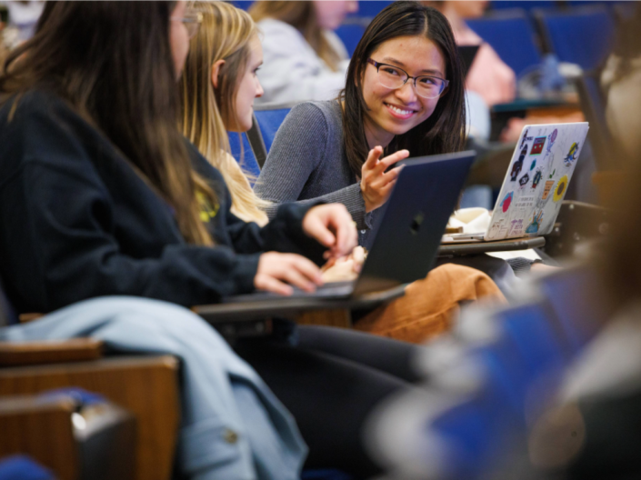 Students collaborating in class