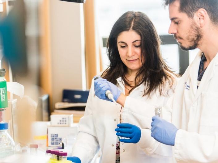 Student and professor in lab