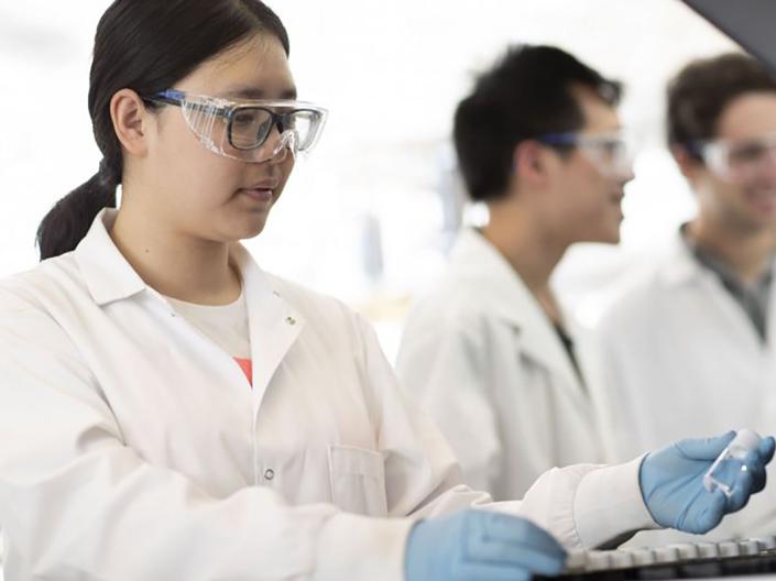 Student researchers in a lab