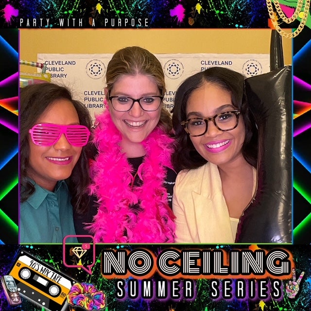 Thomas, McVoy, and Hauser pose in the No Ceiling Summer Series photo booth to commemorate the event.