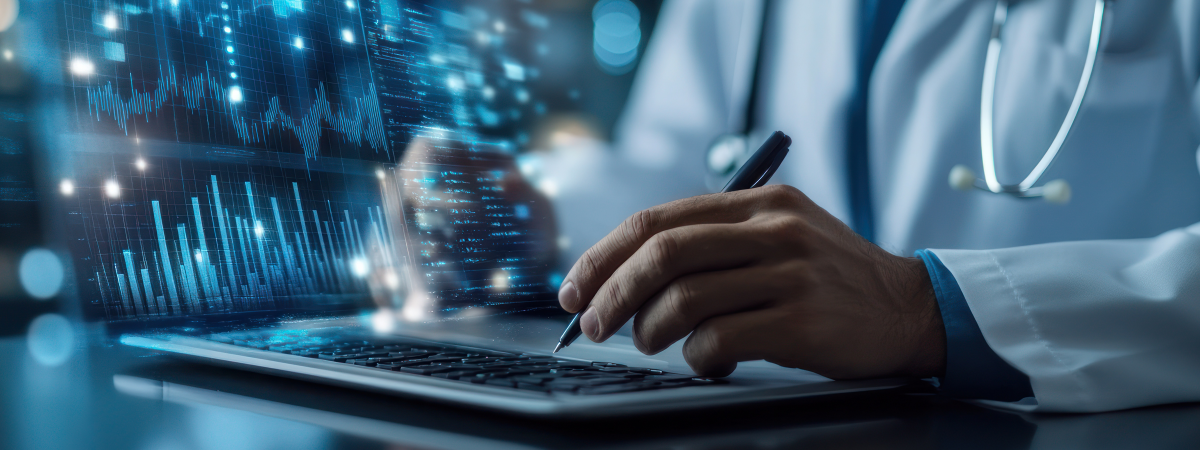 Doctor typing at computer and data is appearing
