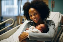 black mother welcoming baby in the hospital