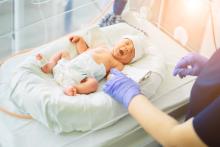newborn being screened in hospital