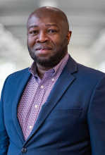 Headshots of George Yendewa