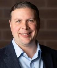 headshot of Adam Perzynski, PhD