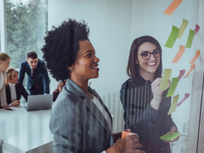 Women working on conference room 