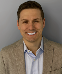 headshot of Ben Clayton