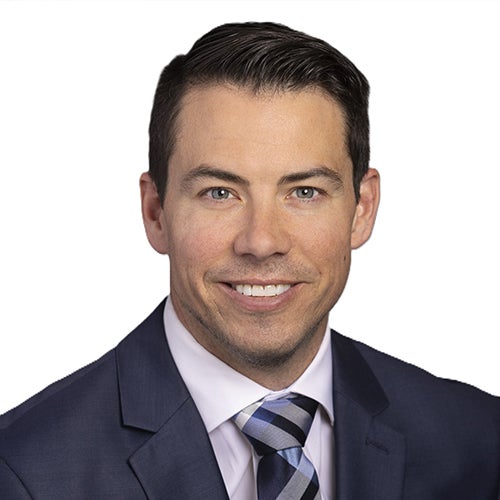 A headshot of Ty Miller