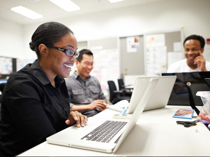 Students working on a computer in class