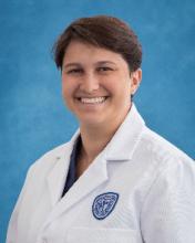 Amraut, Ruthy (woman with white coat and short brown hair)