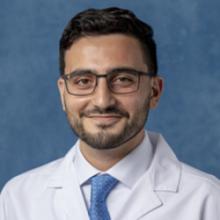 person in white coat