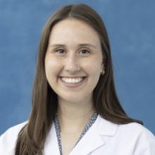 person in white coat