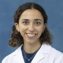 person in white coat