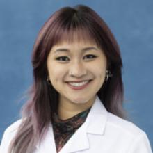 person in white coat