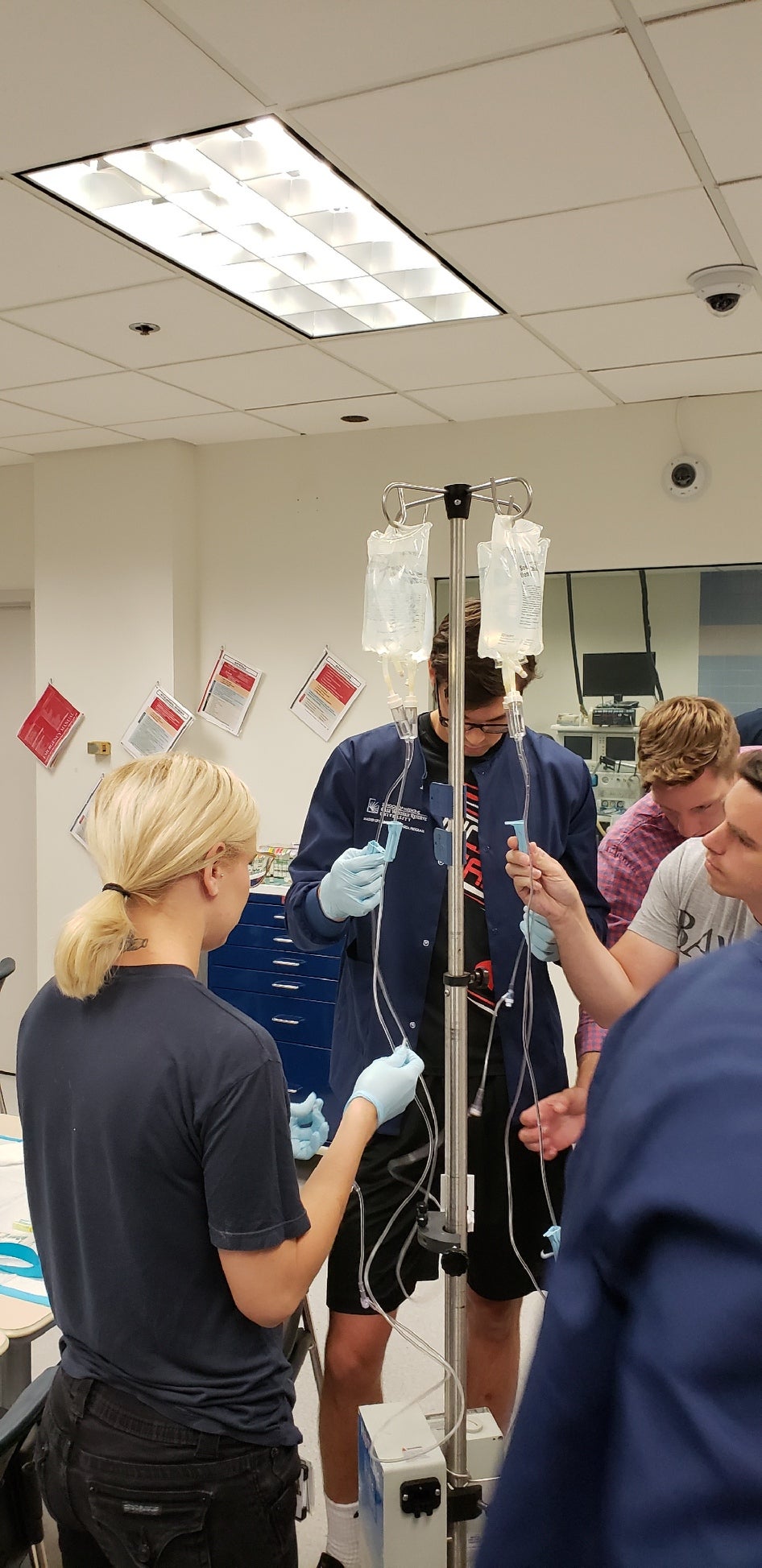 CWRU MSA students standing with IV bags