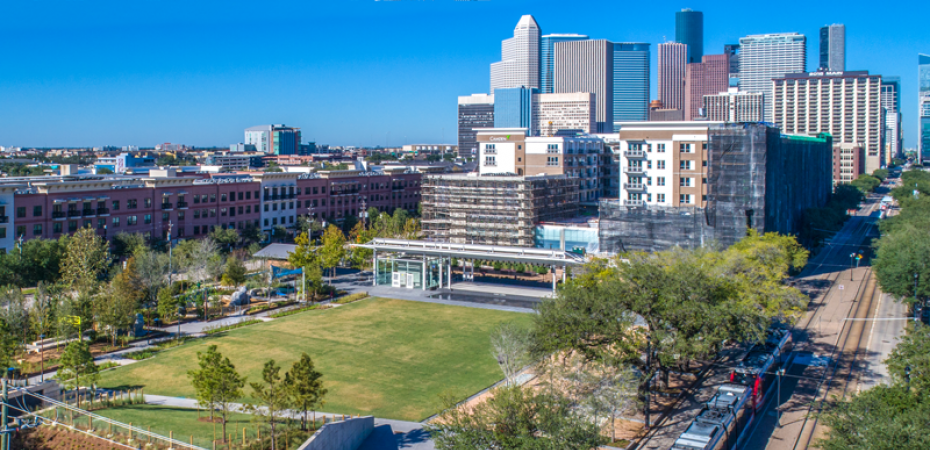 View of Downtown Houston from Midtown Neighborhood with train
