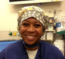 Female certified anesthesiologist assistant in scrubs in operating room