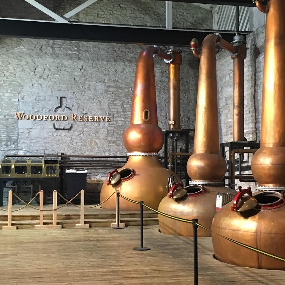 Three bronze casks inside the Woodford Reserve Distillery