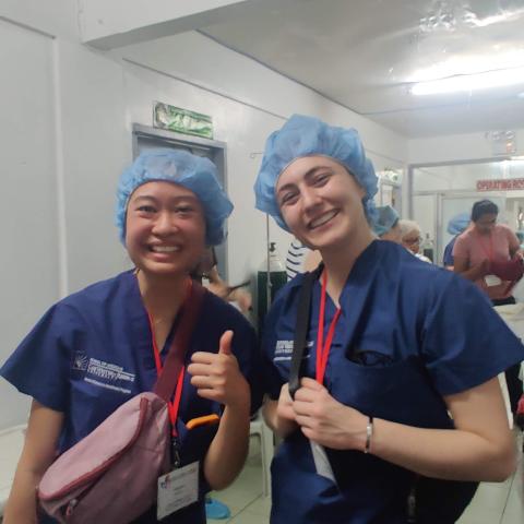 two students in scrubs