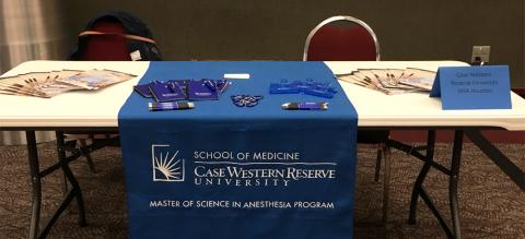Table with banner and promotional items