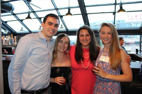 Four Master of Science in Anesthesia students posing together at event