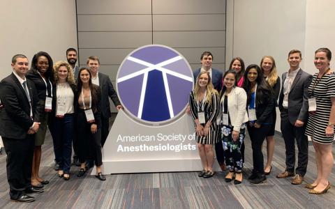 Case Western Reserve University Master of Science in Anesthesia students with sign reading American Society of Anesthesiology