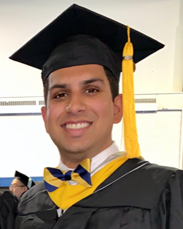 Male anesthesiologist assistant student in graduation robes
