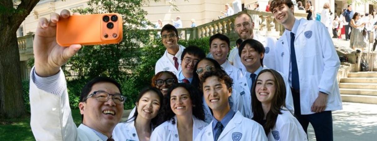 MSTP M1s White Coat Ceremony - Alex selfie AY 2026-27