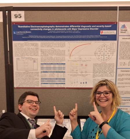 Dr. McVoy and Dr. Serhiy Chumachenko presenting poster at conference