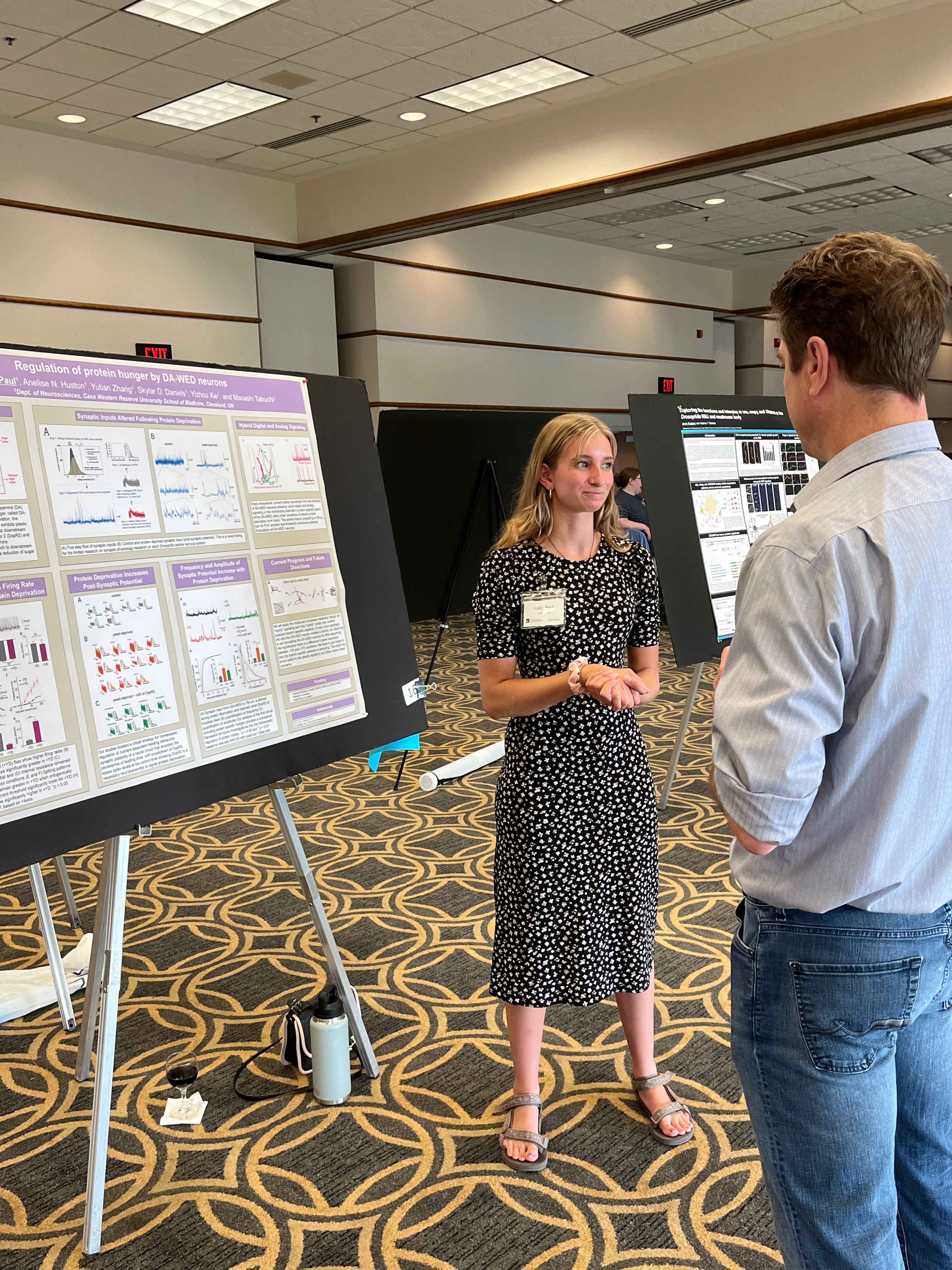 A person is presenting her research