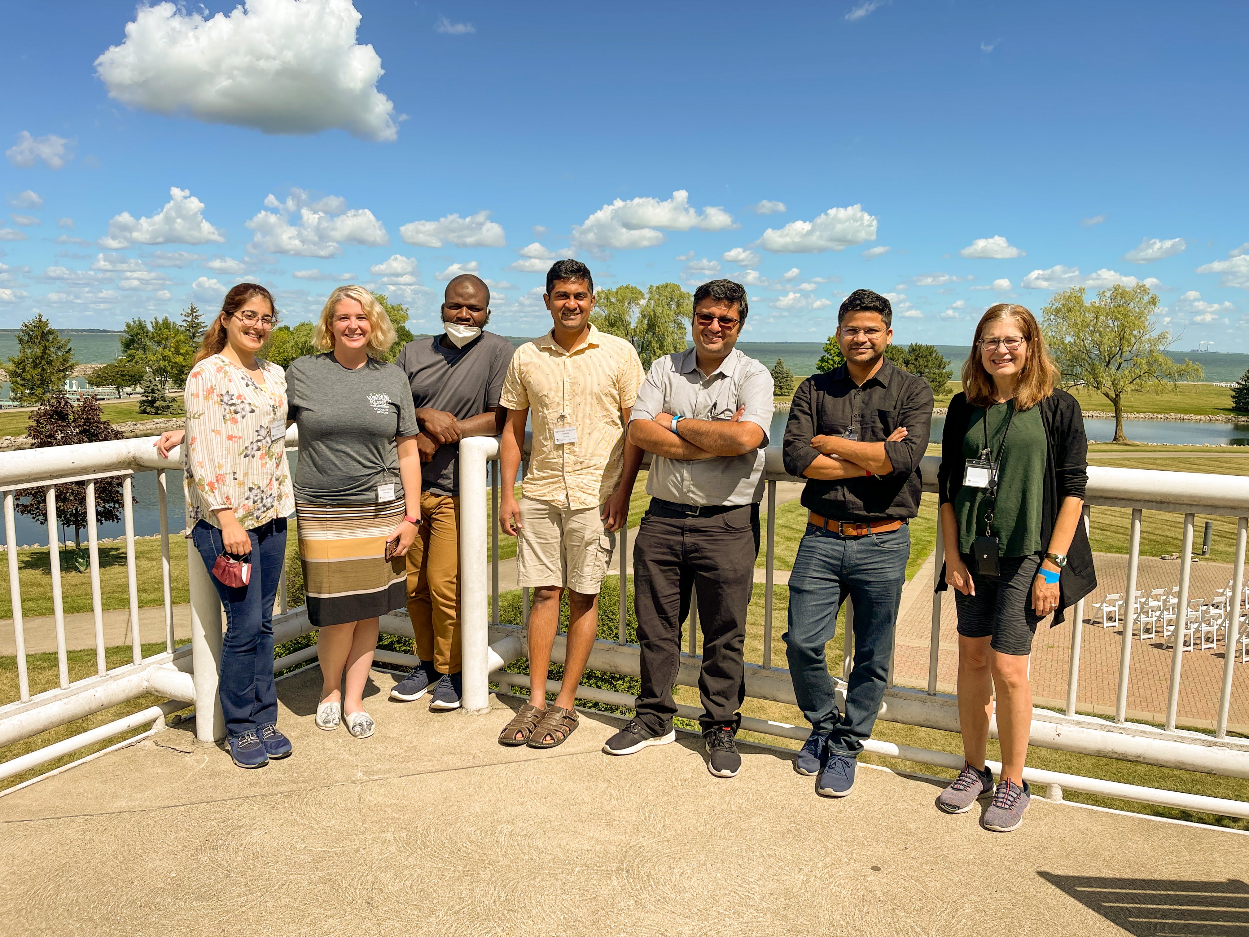 Photo with researchers at a balcony