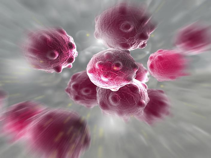 Image of cancer cells in red and white with small protrutions, against a grey and white background
