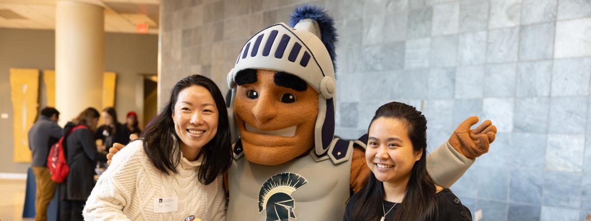 Sparty and Students pose for a photo