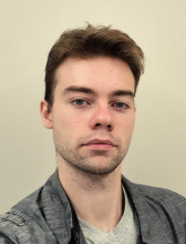 a slightly angled headshot of Roman Boskovoynikov