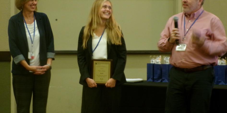 Taylor Baker (PhD candidate in the Keri Lab) receiving the Outstanding Student of the Year Award.
