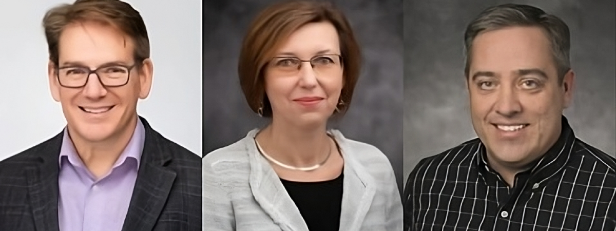 Three faculty members who received promotions
