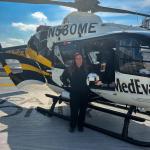 Anna Riddle, Class of 2022, rides on a helicopter as part of her emergency medicine rotation