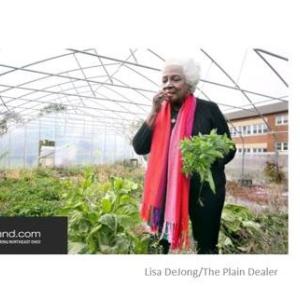 Vel Scott, local food system activist in her greenhouse