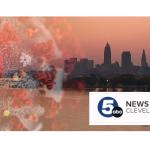 Composite image of Omicron and Cleveland skyline