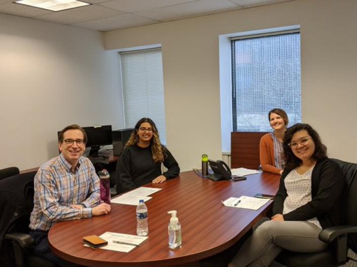 SOM Faculty sitting in a group