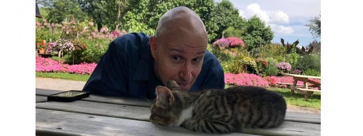 Rob at team retreat - that included cats