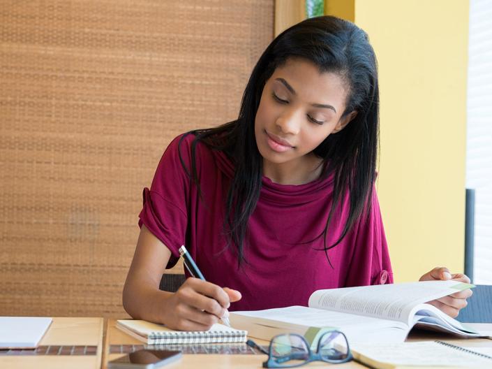 A PREP student working on homework.